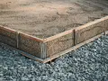 Jakie kruszywo pod płytę fundamentową, aby uniknąć problemów z fundamentem?