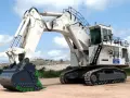Potężna koparka jednonaczyniowa klasy 1 Liebherr z wielkim, zielonym chwytakiem, gotowa do pracy w kopalni.