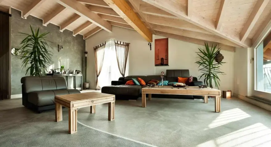 Nowoczesny salon z podłogą z żywicy. Sprawdź podłoga z żywicy cena za metr, by stworzyć podobne wnętrze.